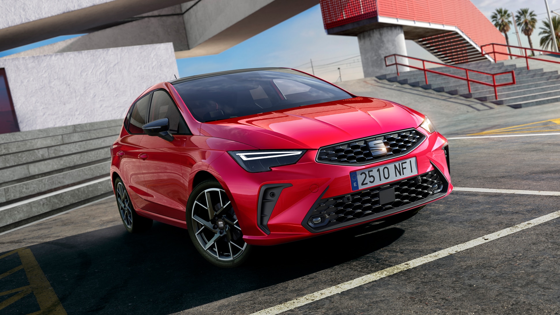 Volledige weergave van een SEAT Ibiza 2025 in rood, buiten geparkeerd Volledige weergave van een SEAT Ibiza 2025 in rood, buiten geparkeerd