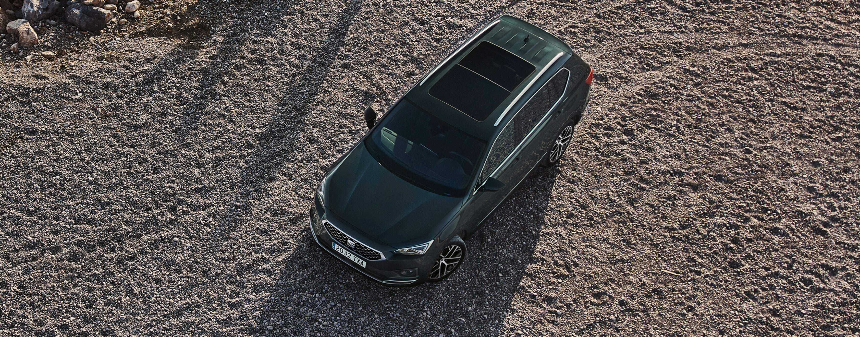 New SEAT Tarraco dark camouflage colour parked at the beach