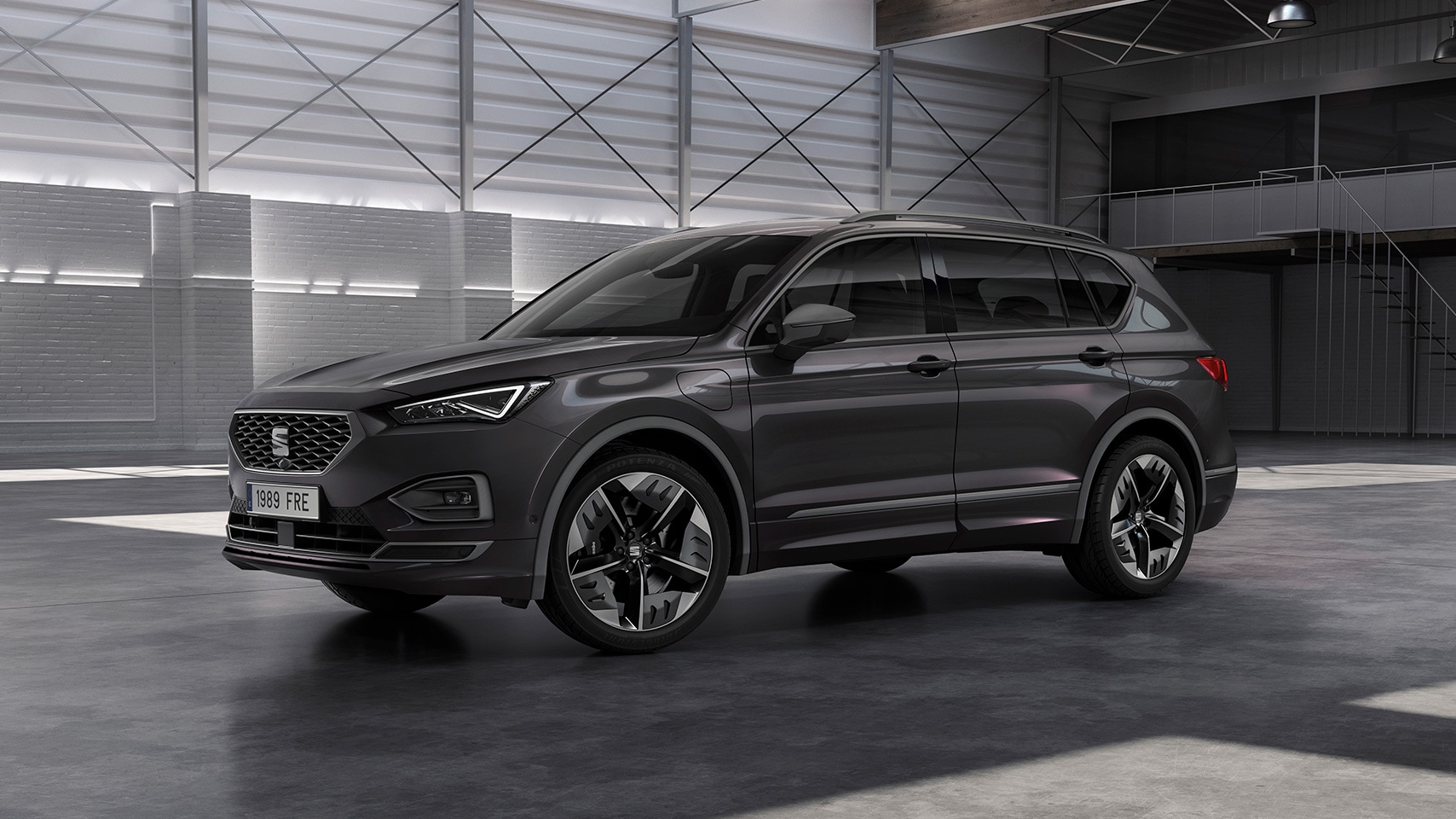 De nieuwe SEAT Tarraco FR PHEV, zijaanzicht.